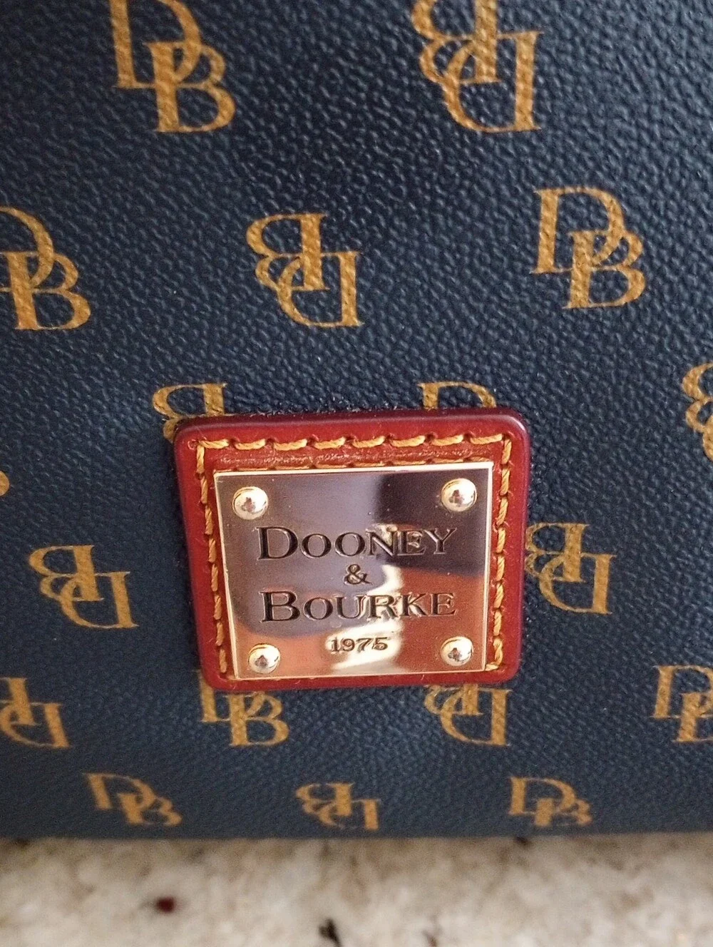 Dooney & Bourke Signature Bag